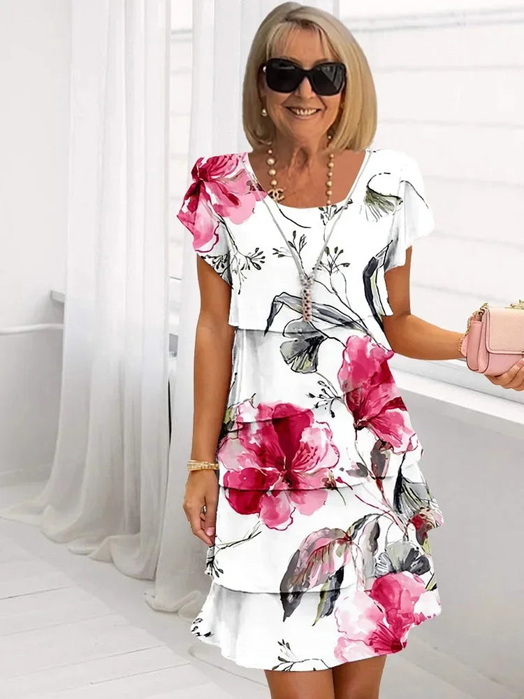 Giselle™ - Vestido plisado con volantes florales